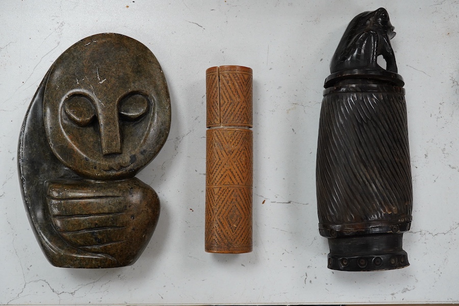 A carved root handled walking stick, a carved Indonesian horn container, an African Honer sculpture, a carved clay pipe etc (6), Walking stick 84cm long. Condition- walking stick and container split, other items fair to
